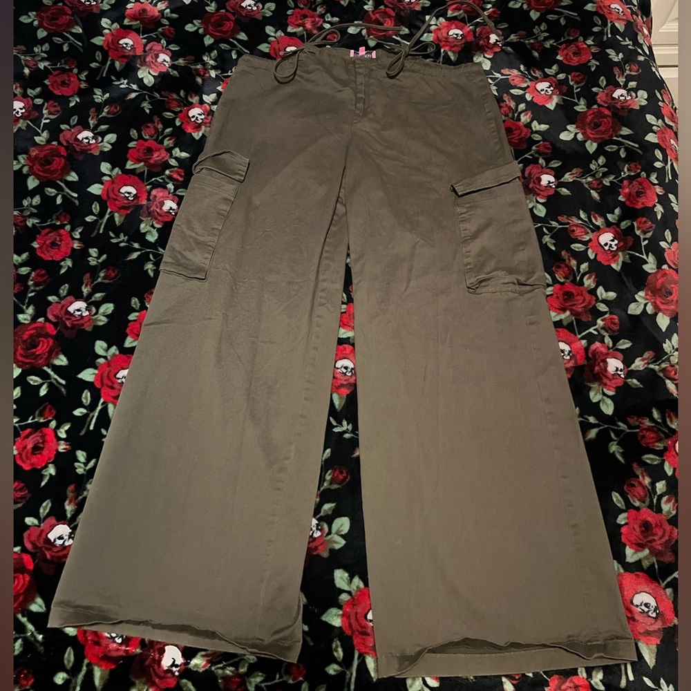 Edikted army green cargo pants. Flared, baggy, cutouts on top with tie.